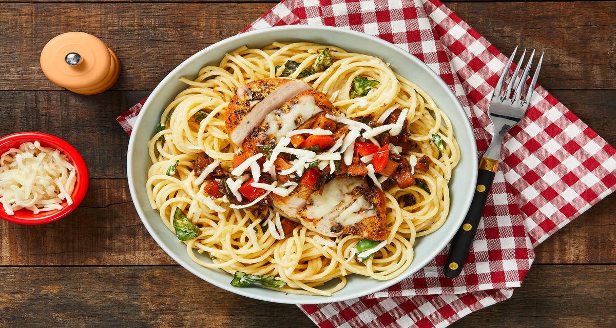 Margherita Chicken over Garlic Herb Spaghetti