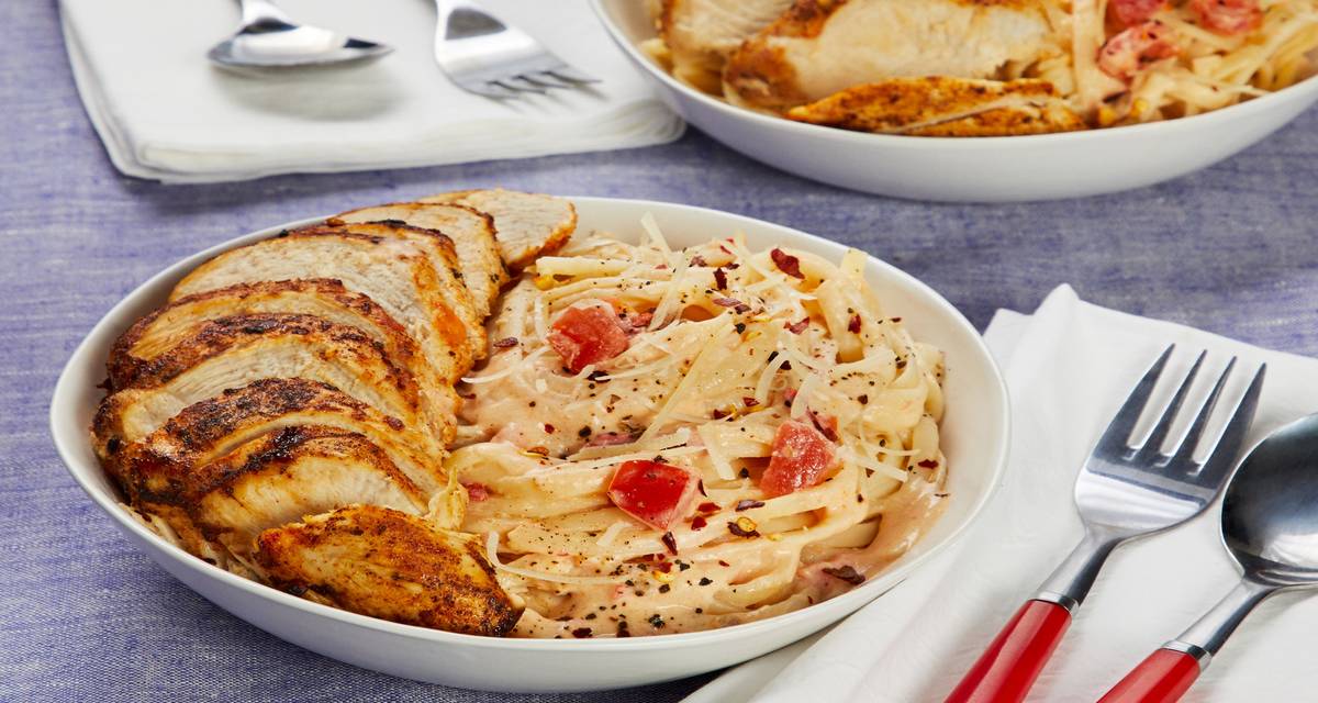 Tuscan Herbed Chicken over Creamy Tomato Linguine