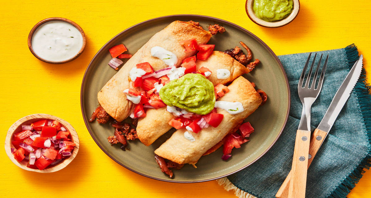 Beef Flautas Supreme with Pico de Gallo, Lime Crema & Guacamole