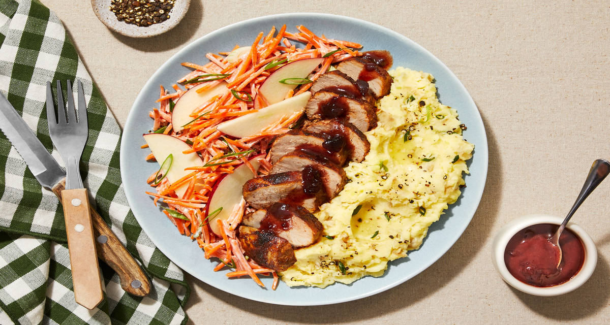Sweet & Smoky Pork Tenderloin with Apple Carrot Slaw, Mashed Potatoes & Cherry Sauce