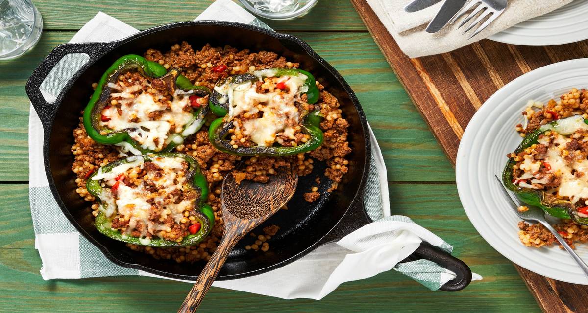Tuscan Beef-Stuffed Peppers with Pearled Couscous & Melted Monterey Jack