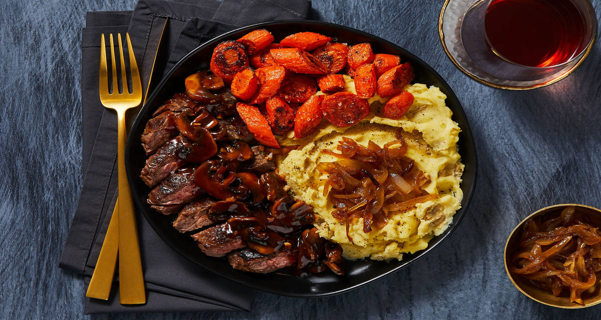 Bavette Steak in a Mushroom Sauce with Caramelized Onion Mashed Potatoes & Roasted Carrots