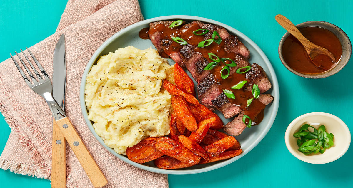 Seared Steak with Demi Reduction served with Garlic Mashed Potatoes & Honey-Roasted Carrots