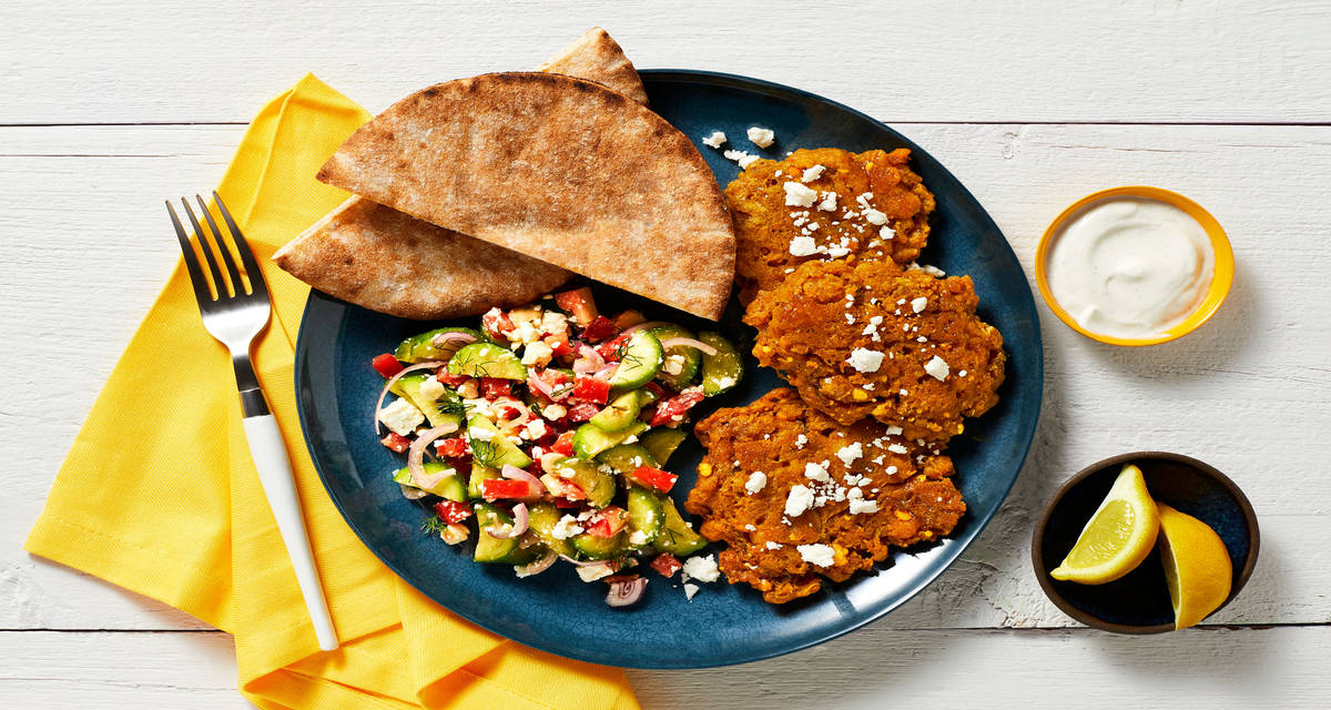 Spiced Chickpea Fritters with Greek Salad, Pita & Garlicky White Sauce