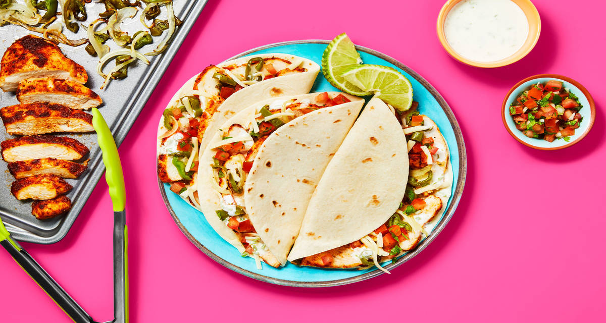 Sheet Pan Chicken & Pepper Fajitas with Pico de Gallo, Monterey Jack & Lime Crema