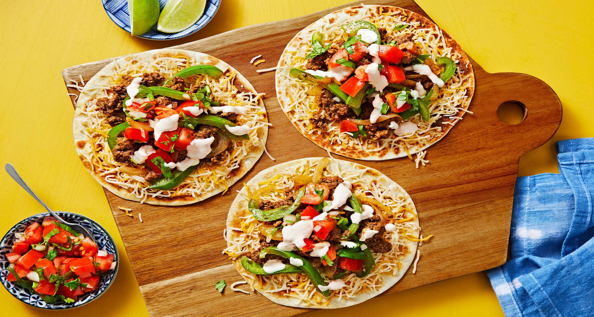 Beef & Cheese Tostadas with Green Bell Pepper, Tomato Salsa & Hot Sauce Crema