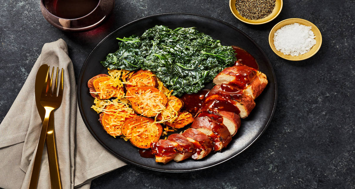Garlic Dijon Prosciutto-Wrapped Chicken with Creamed Kale & Parmesan Shingled Sweet Potatoes