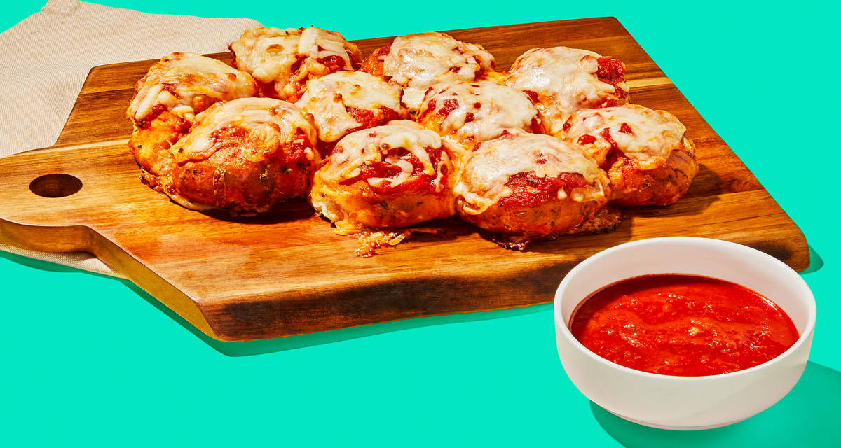 Cheesy Pull-Apart Pizza Biscuit Bombs You’ll want a pizza this. | 4 Servings