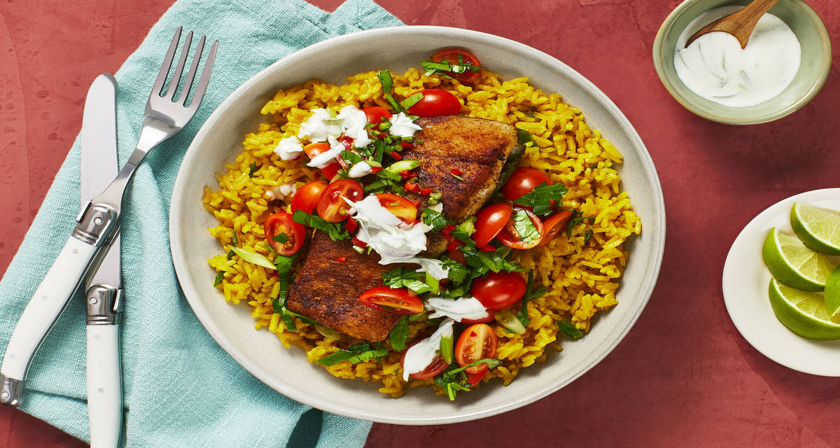 Baja Barramundi with Yellow Rice, Salsa Fresca & Zesty Crema
