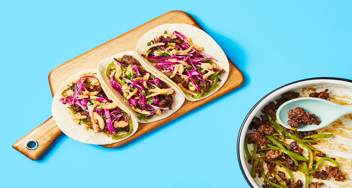 One-Pan Beef Stir-Fry Tacos with Tangy Slaw, Sriracha Mayo & Crispy Fried Onions
