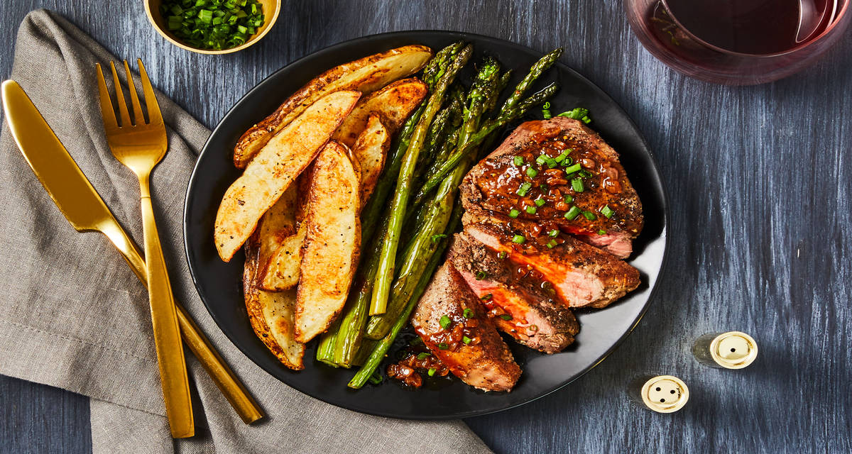 Beef Tenderloin & Garlic Herb Pan Sauce with Asparagus & Basil Roasted Potatoes