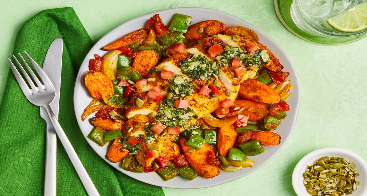 Peruvian-Style Roasted Chicken carrots, bell pepper, tomato, creamy chimichurri, pepitas