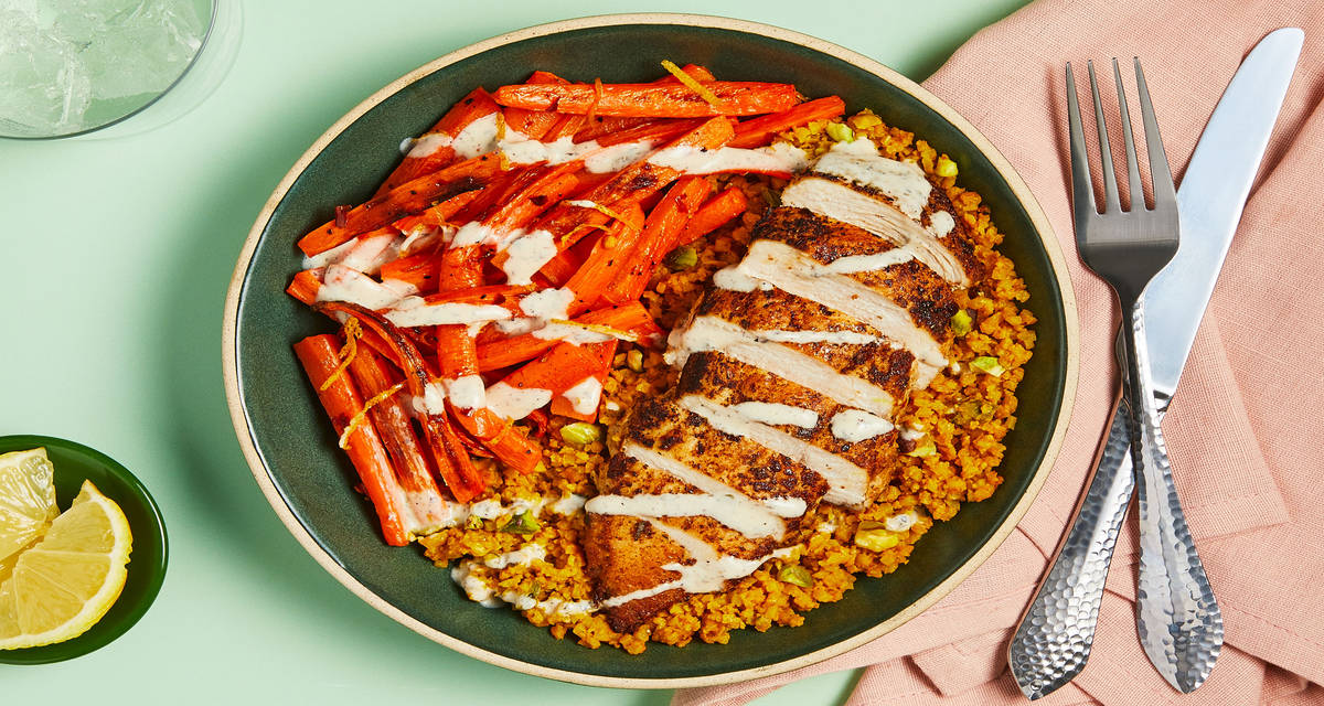 Spicy Tunisian Chicken pistachio cauliflower “rice,” spicy lemon carrots, yogurt