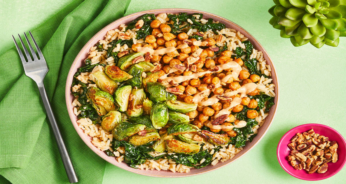 Cajun-Spiced Chickpea Power Bowls maple Brussels sprouts, kale rice, toasted pecans