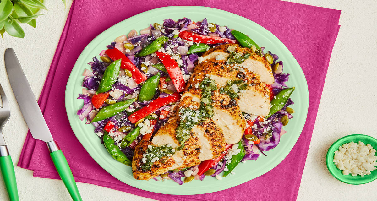 Cuban Chicken with Chimichurri red bell pepper, snap peas, cabbage, pepitas, cotija