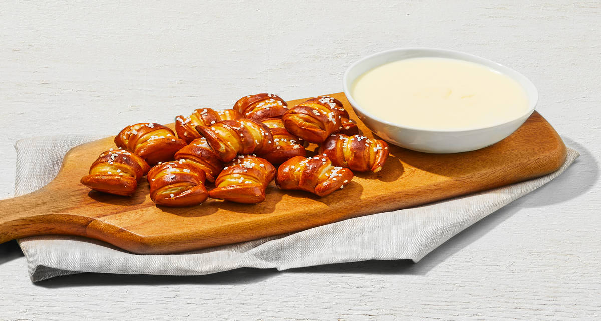 Salted Pretzel Bites with White Cheddar Sauce Pretz-ell yeah! | 2 Servings