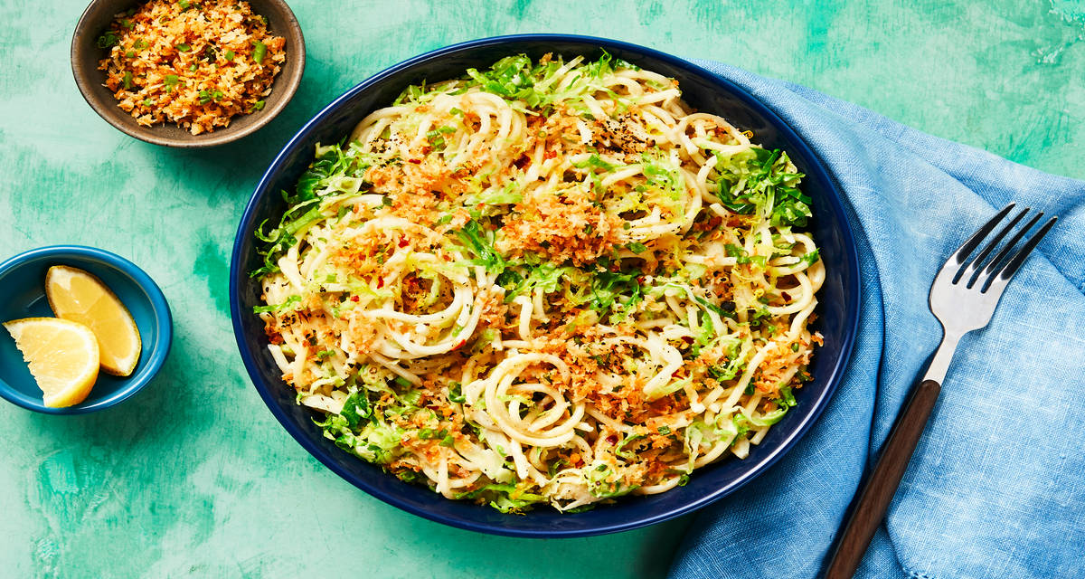Spaghetti with Salmon & Brussels Sprouts sprinkled with Toasted Panko & Scallions