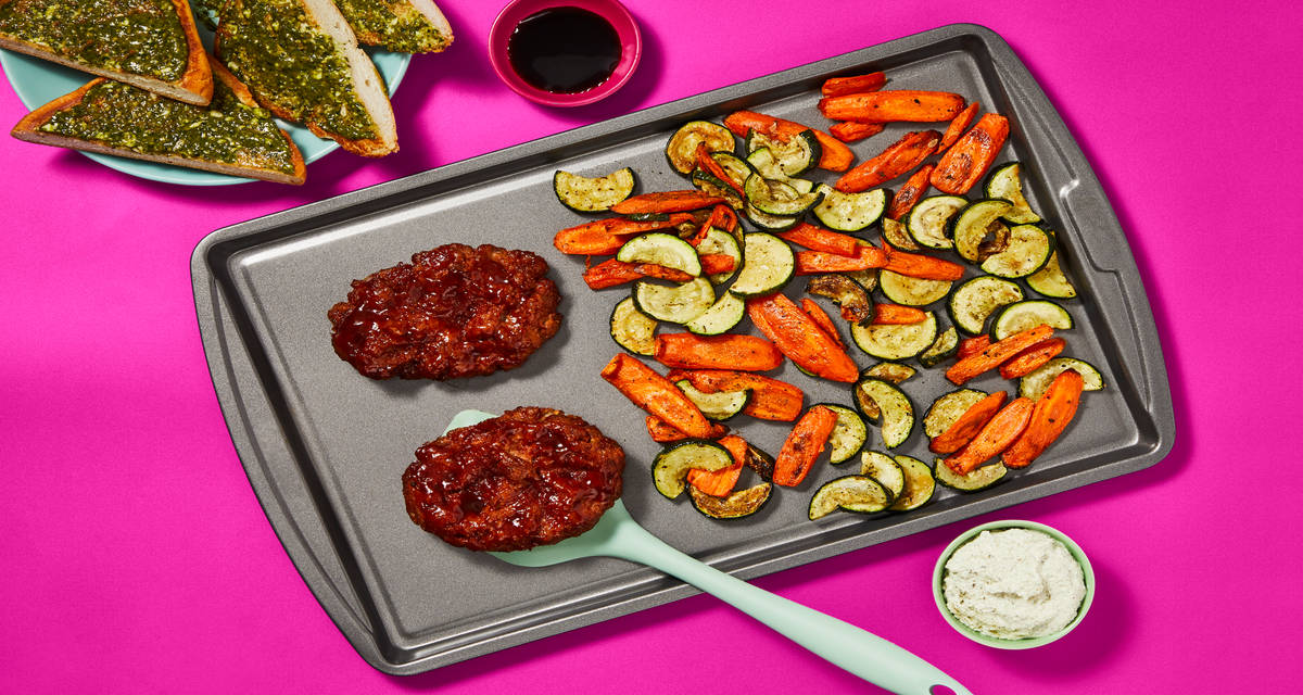 Sheet Pan Italian Beef Meatloaves with Balsamic Zucchini Medley, Herbed Ricotta & Pesto Garlic Bread