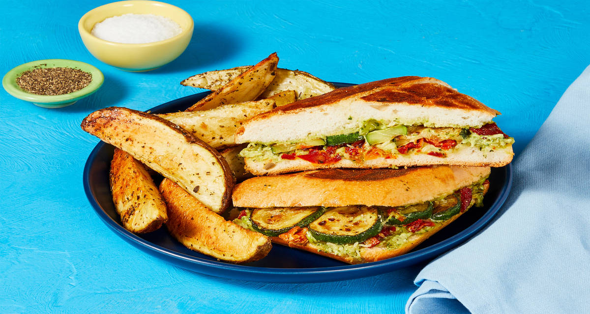 Chicken & Sun-Dried Tomato Panini with Zucchini, Mozzarella, Pesto Mayo & Roasted Potato Wedges