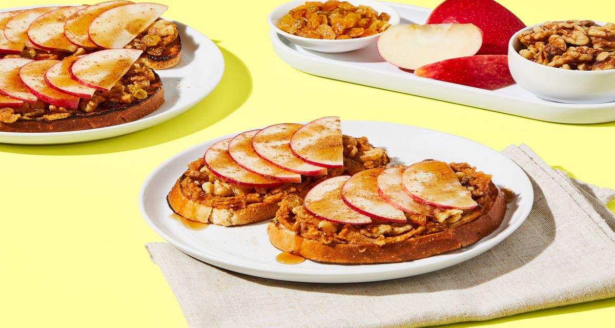Crème Fraîche Peanut Butter Toasts with Raisins, Walnuts, Cinnamon Apple & Maple Syrup Drizzle
