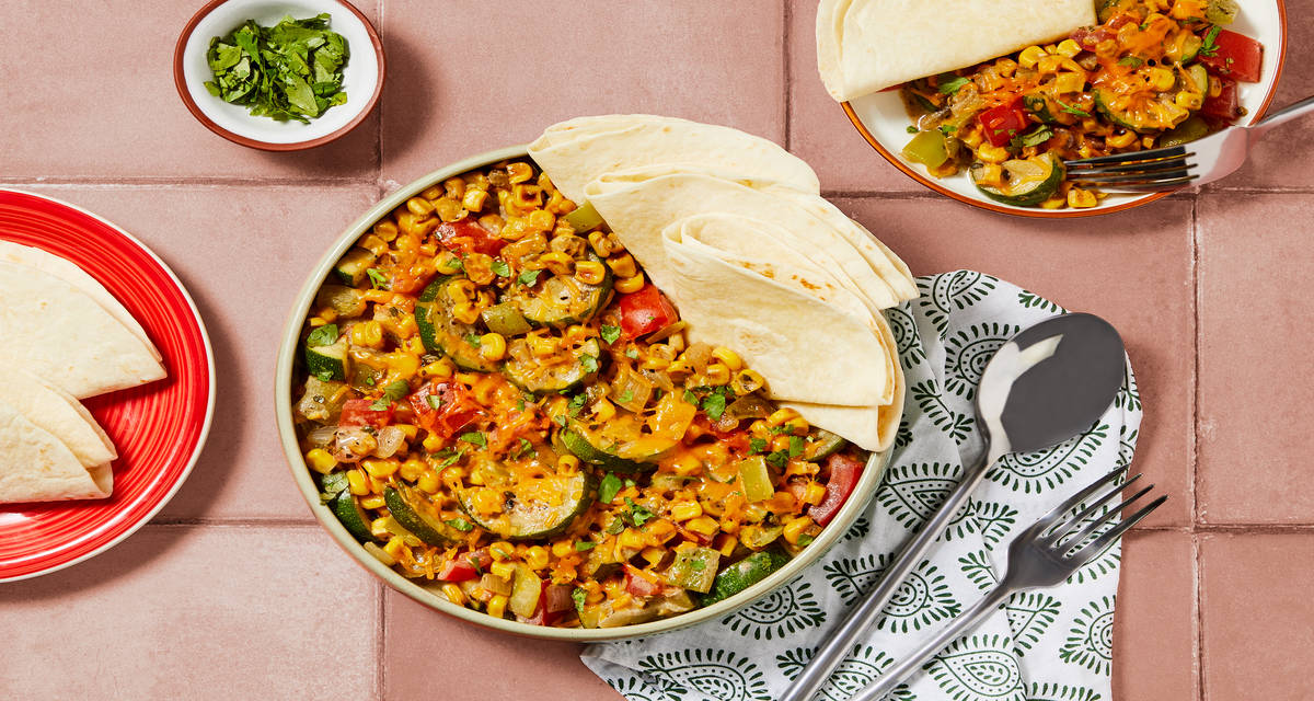 Mexican-Inspired Calabacitas Con Queso Zucchini with Tortillas & Cilantro