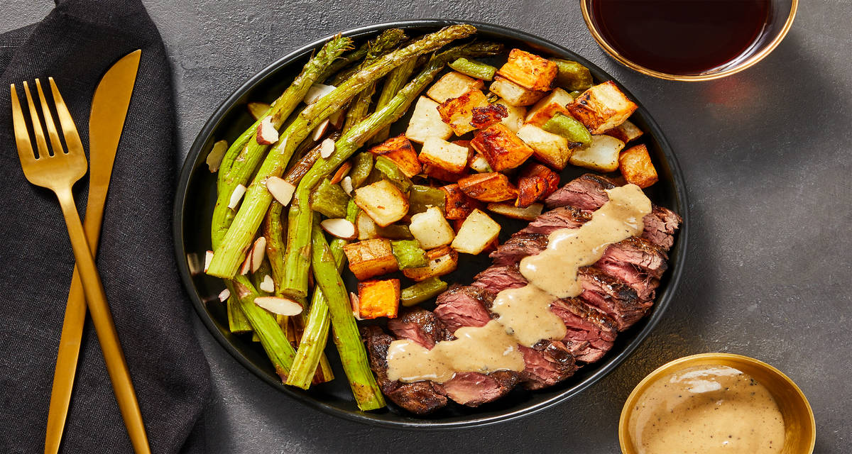 French Onion Bavette Steak with Mixed Potato Hash & Asparagus Amandine