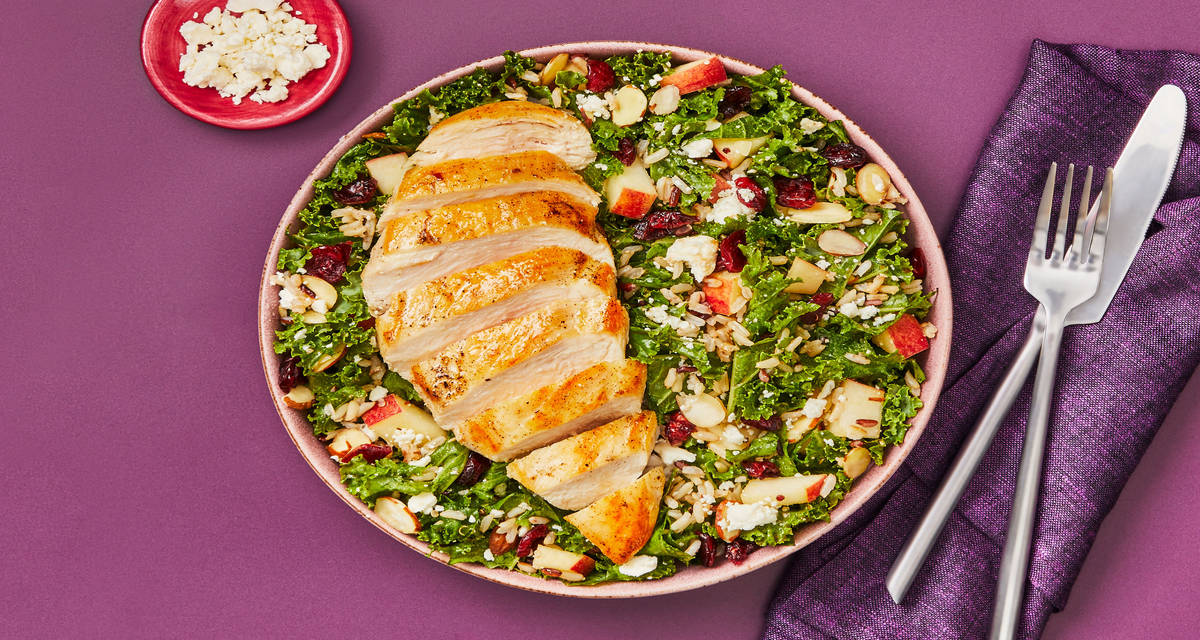 Warm Chicken, Apple & Kale Grain Bowls with Feta, Dried Cranberries, Almonds & Balsamic Vinaigrette