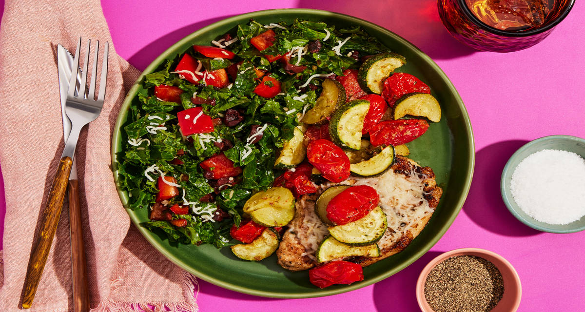 Pork Chops with Roasted Squash & Tomatoes  red bell pepper, olives, kale salad with mozzarella
