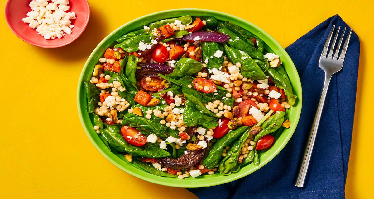 Spanakopita Spinach Salad with Couscous plus Marinated Tomatoes, Roasted Carrots & Pistachios