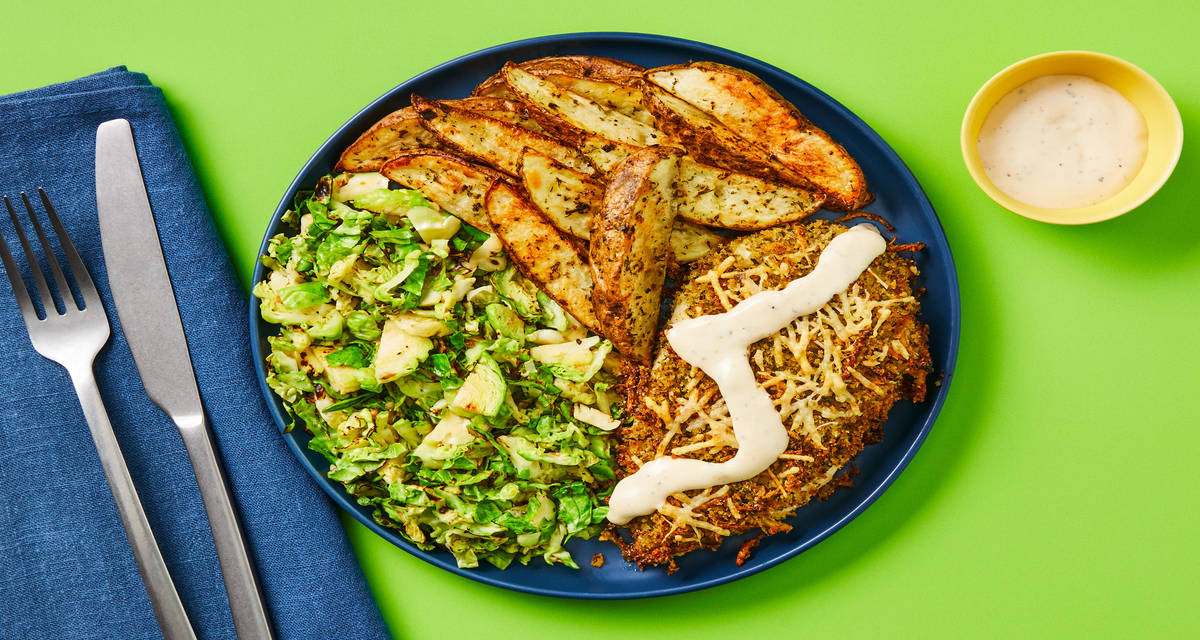 Crispy Caesar Chicken with Herby Potato Wedges & Brussels Sprouts