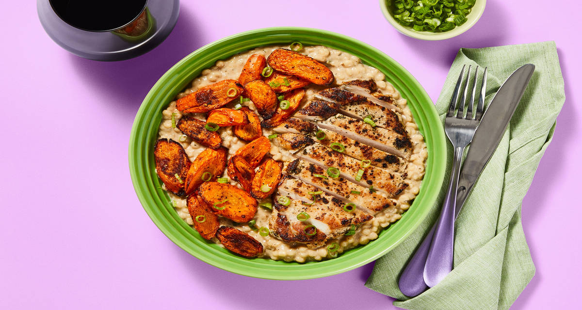 Chicken over Creamy Parmesan Couscous with Roasted Carrots