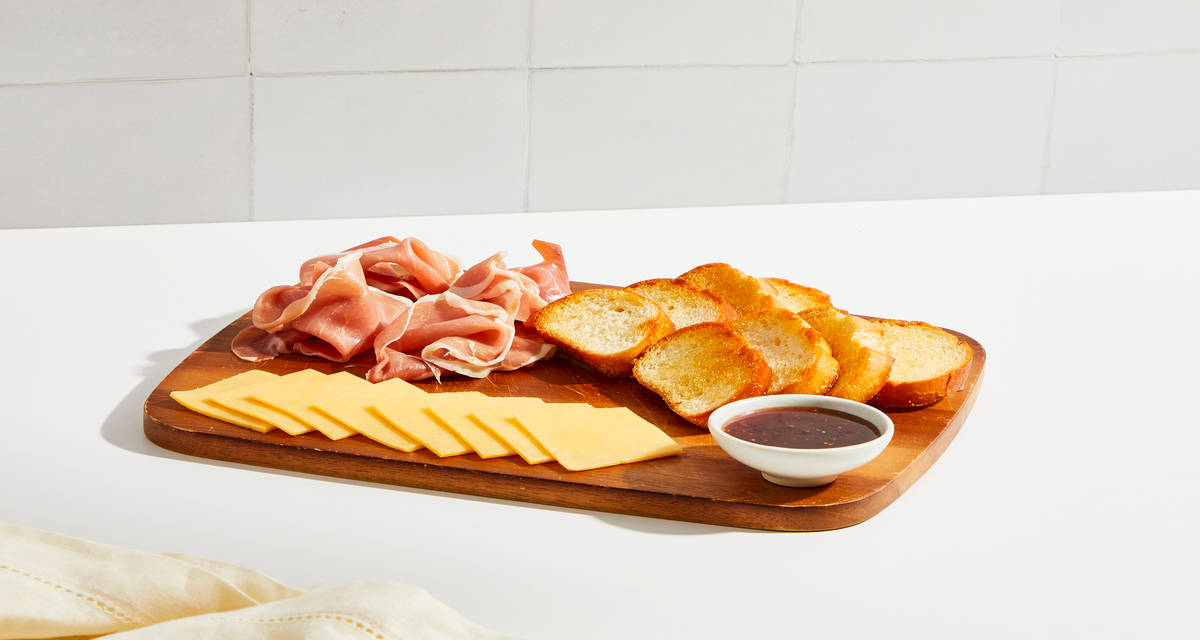 Prosciutto & Gouda Crostini Board 2 Servings | fig jam
