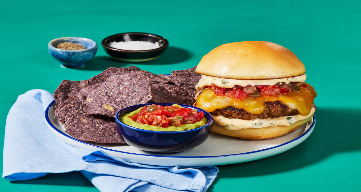 Cheesy Cantina Pork Burgers with Cilantro Mayo, Tortilla Chips & Guacamole