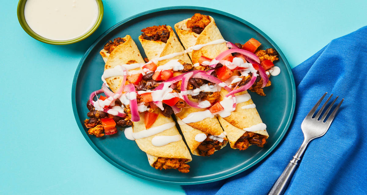 Toasty Beef & Black Bean Flautas with Pickled Onion, Tomato & Crema