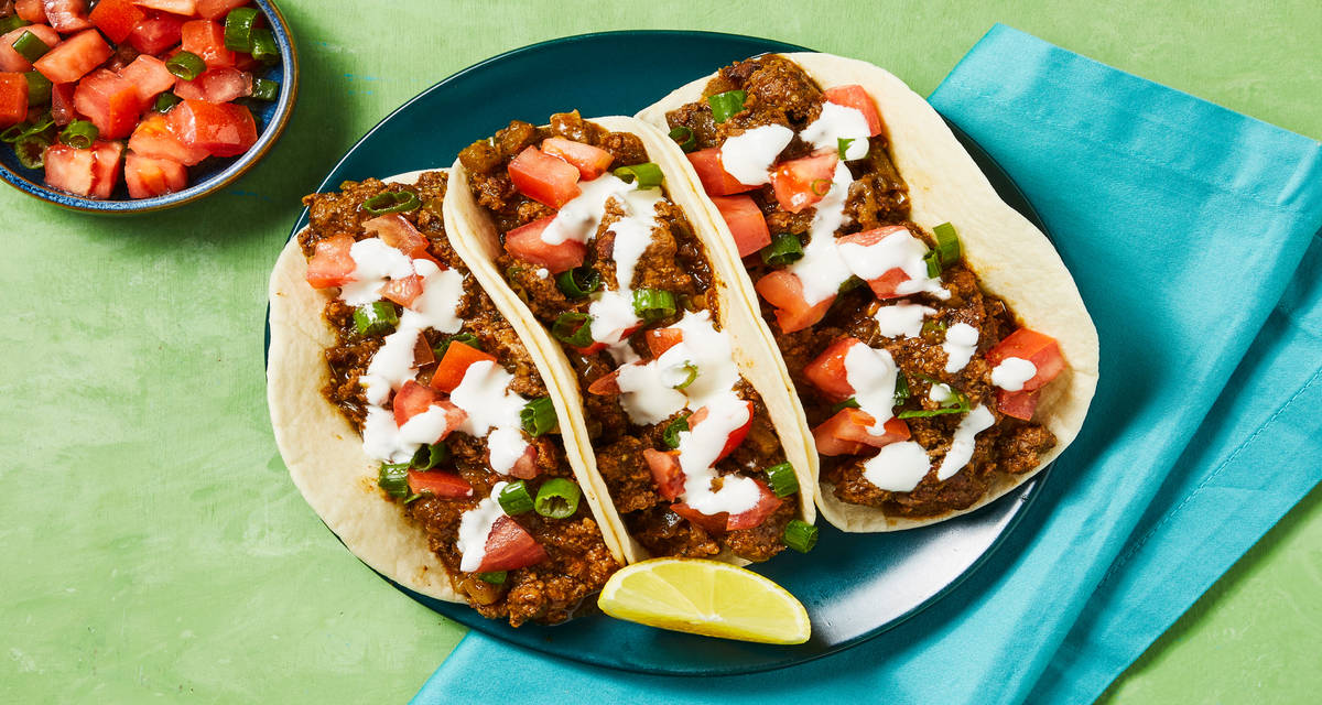 Spicy Salsa Verde Beef Tacos with Crema & Pico de Gallo