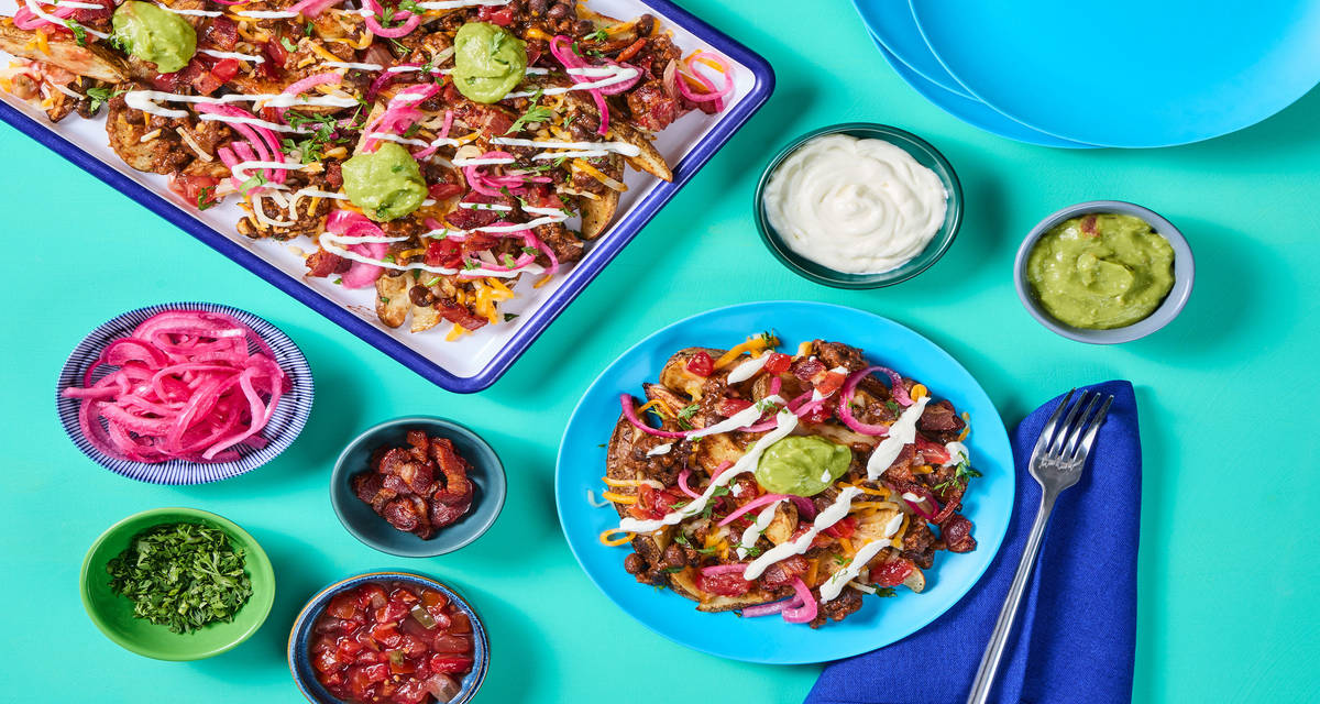 Fully Loaded Chili & Bacon Potato Nachos with Guacamole, Pico de Gallo, Sour Cream & Pickled Red Onion