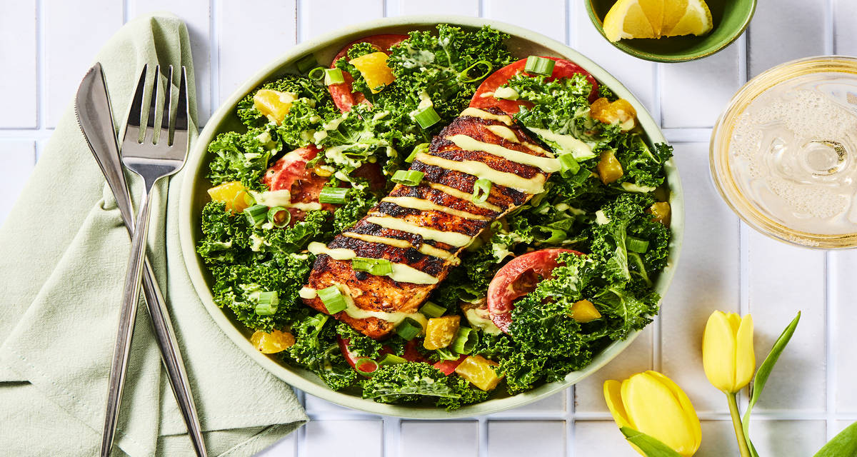 Seared Salmon & Kale Salad with Mango Tangy Avocado Dressing, Tomato, Scallion