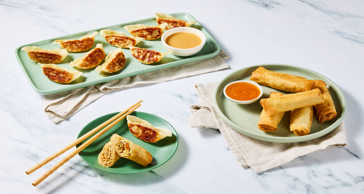 Veggie Dumplings & Veggie Spring Rolls Board with Gyoza Sauce, Pickled Cucumbers & Sesame Slaw | 4 Servings