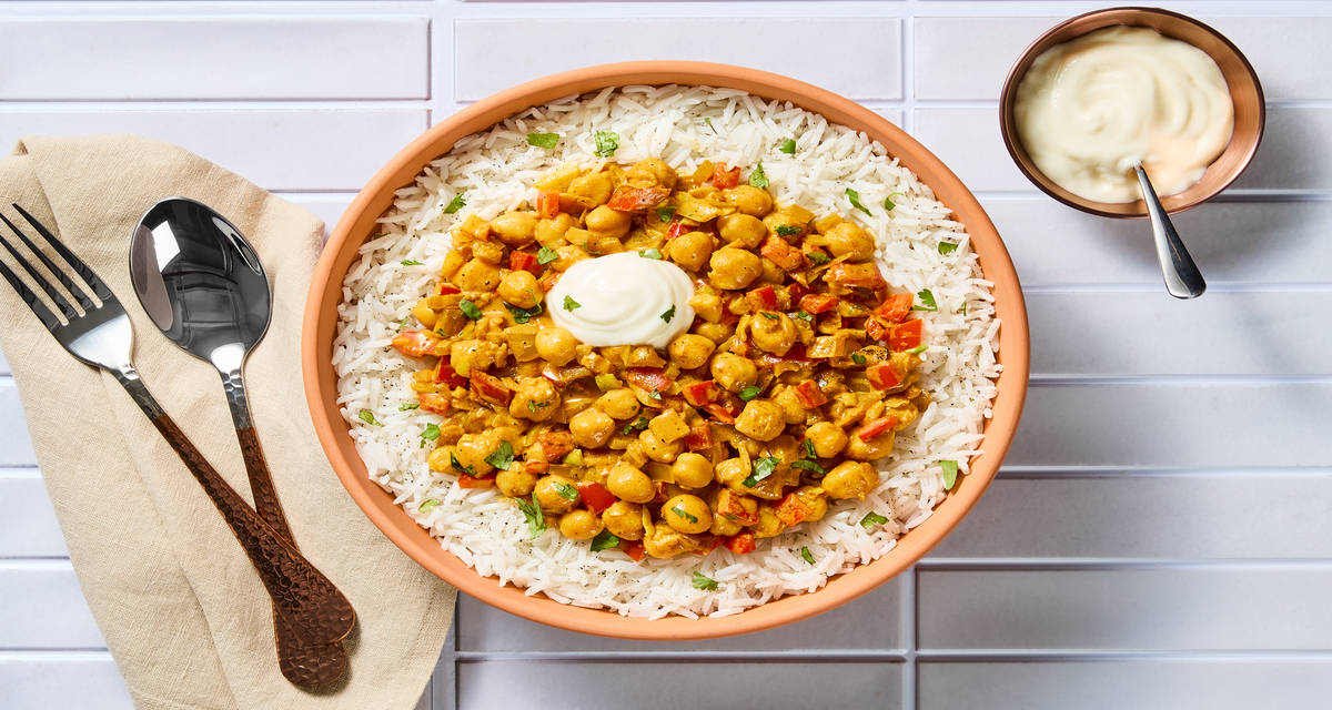 Indian-Style Chickpea Coconut Curry Served with Basmati Rice & Topped with Yogurt