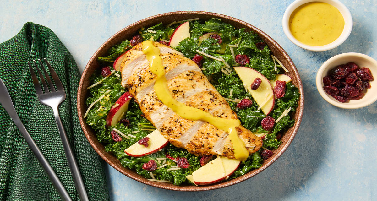 Herbed Salmon over Apple & Kale Salad with Parmesan, Dried Cranberries & Dijon Dressing