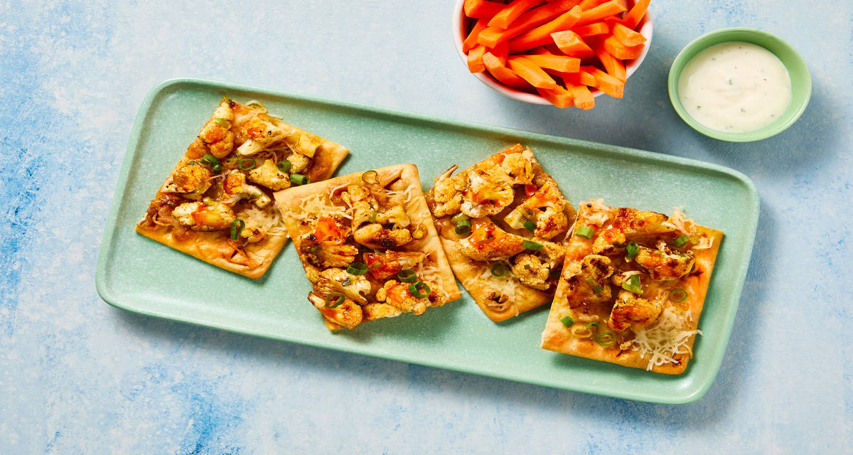 Spicy Buffalo Cauliflower Flatbreads with Mozzarella, Scallions, Carrot Sticks & Ranch Dressing