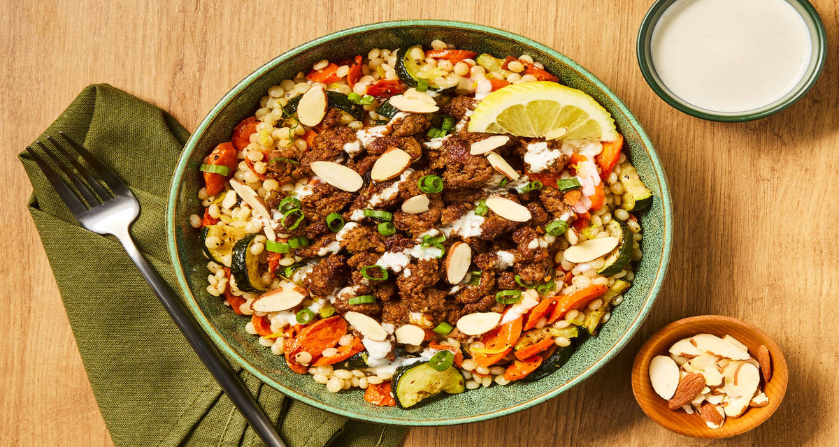 Spice Is Nice Beef Couscous Bowls with Za’atar Roasted Veggies, Lemony Garlic Sauce & Almonds