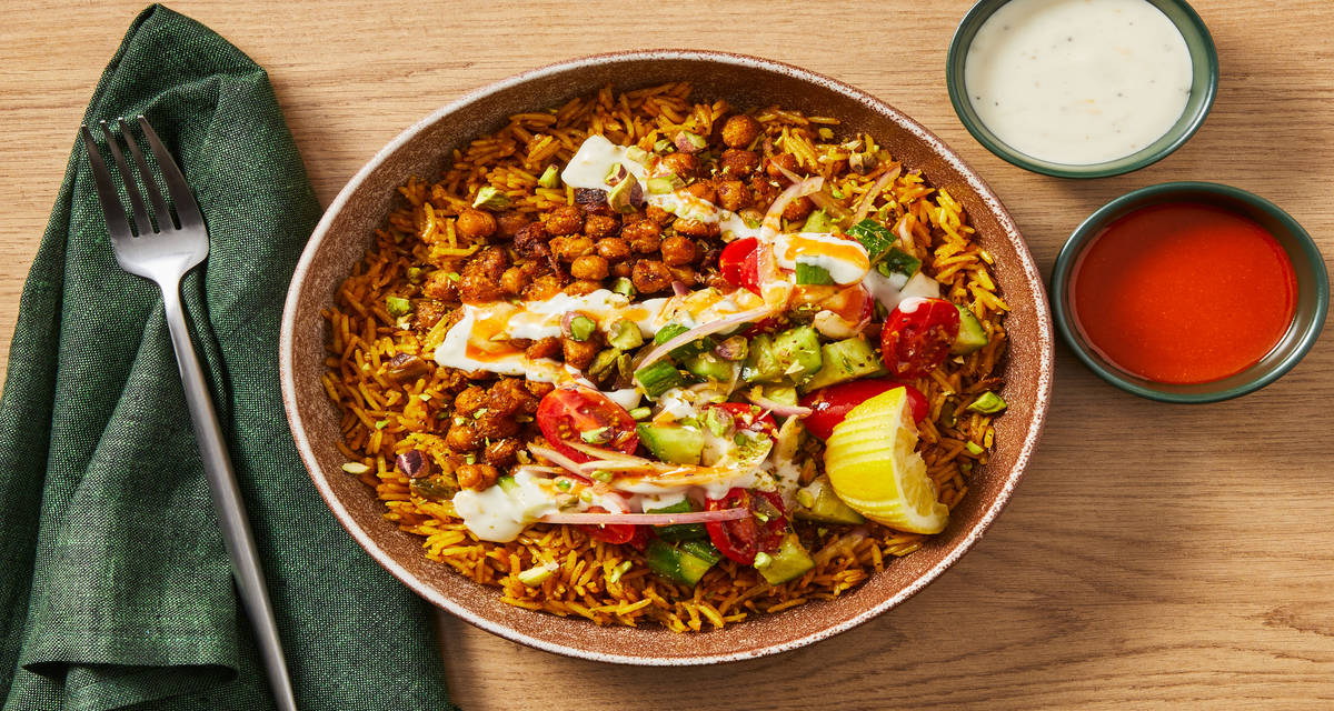 Spiced Organic Chicken & Chickpeas with Pistachio Rice, Cucumber Salad & Garlicky White Sauce