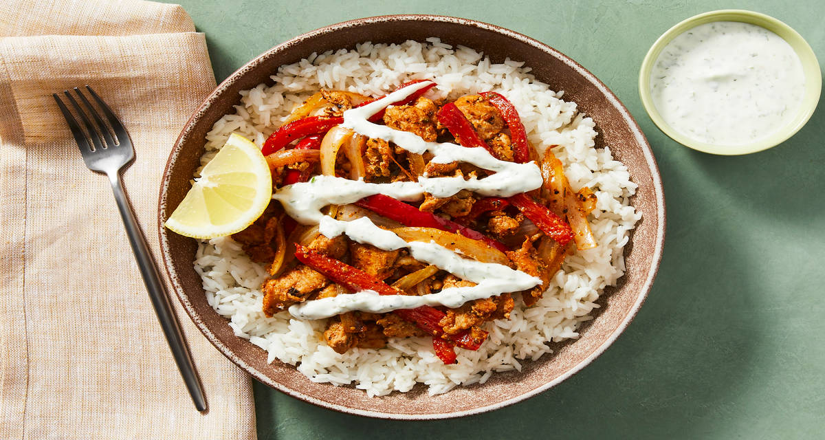 Smoky Paprika Chicken & Rice Bowls with Chicken Thighs, Bell Pepper & Lemon-Cilantro Crema