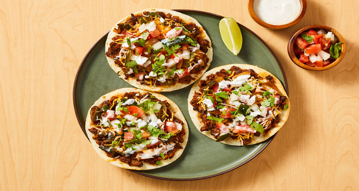 Smashed Black Bean & Chicken Tostadas with Green Pepper, Pico de Gallo & Lime Crema