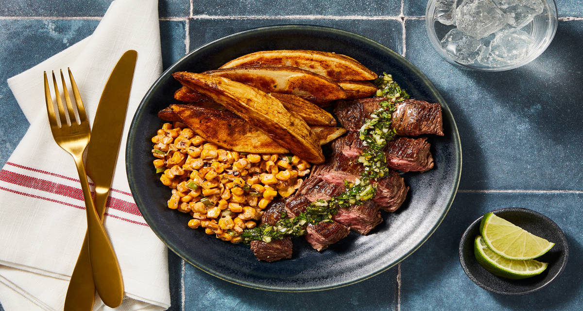 Uruguayan-Style Churrasco Steaks with Chimichurri, Roasted Potatoes & Corn Salad