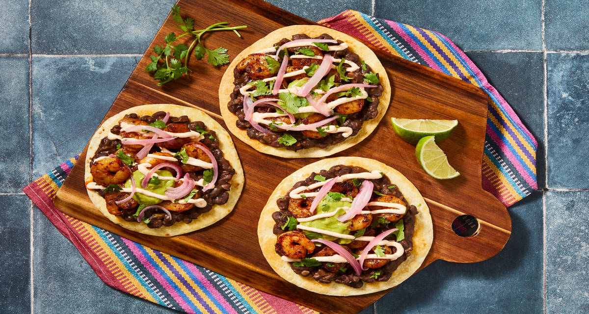 Mexican Shrimp & Black Bean Tostadas with Pickled Shallot, Red Pepper Crema & Guacamole