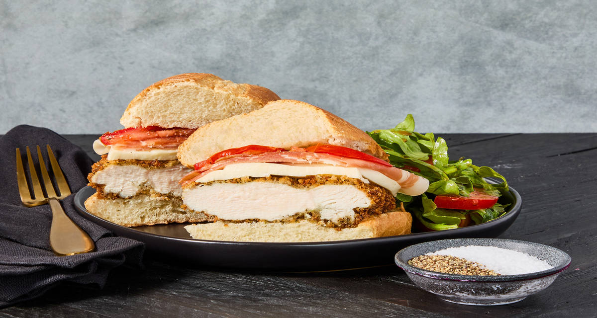 Chicken Cotoletta Suprema Subs with Prosciutto, Fresh Mozzarella & Balsamic Dressed Arugula