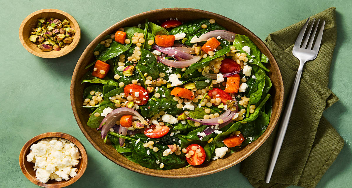 Spinach Salad with Chicken & Couscous plus Marinated Tomatoes, Roasted Carrots & Pistachios