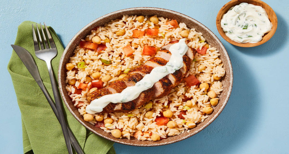 Tex-Mex-Style Chicken  with Spiced Tomato-Chickpea Rice & Scallion Crema